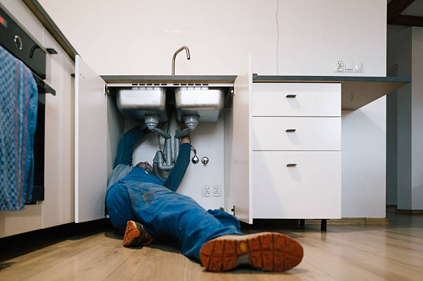 Professional Emergency Plumber technician working in Foxboro, MA